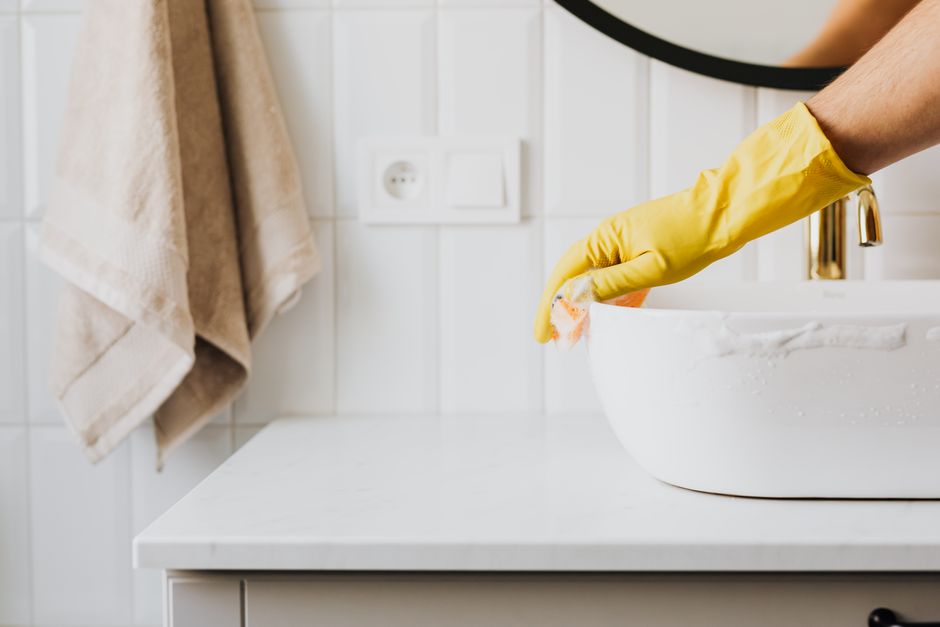 Cleaning a modern bathroom sink